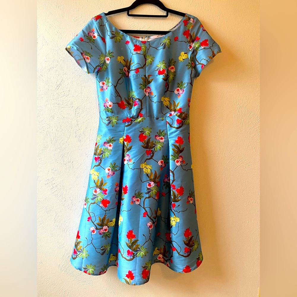 Dupion silk. Fit and flare, knee length dress.